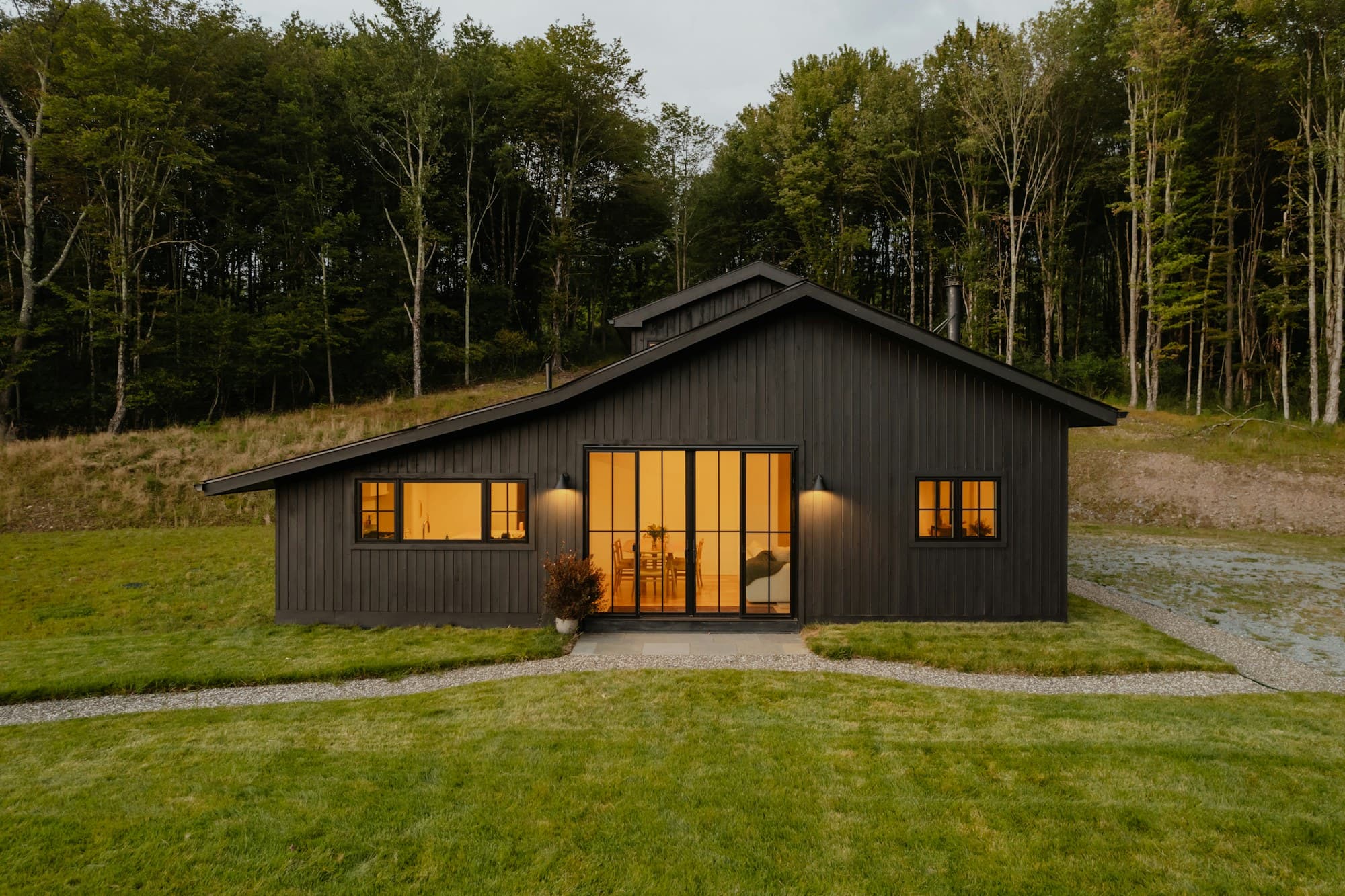 A completed HAVN Studios garden room exterior at dusk